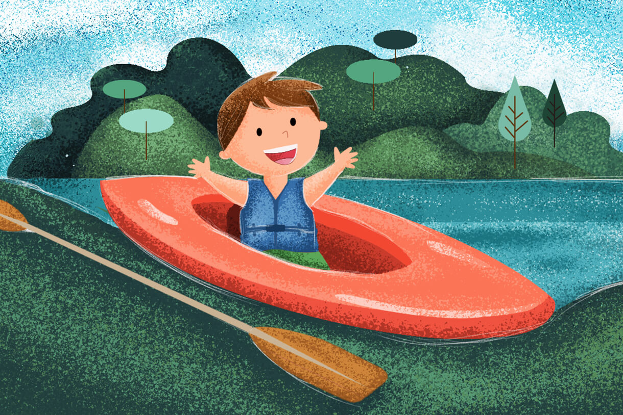 Uśmiechnięte dziecko w kajaku.